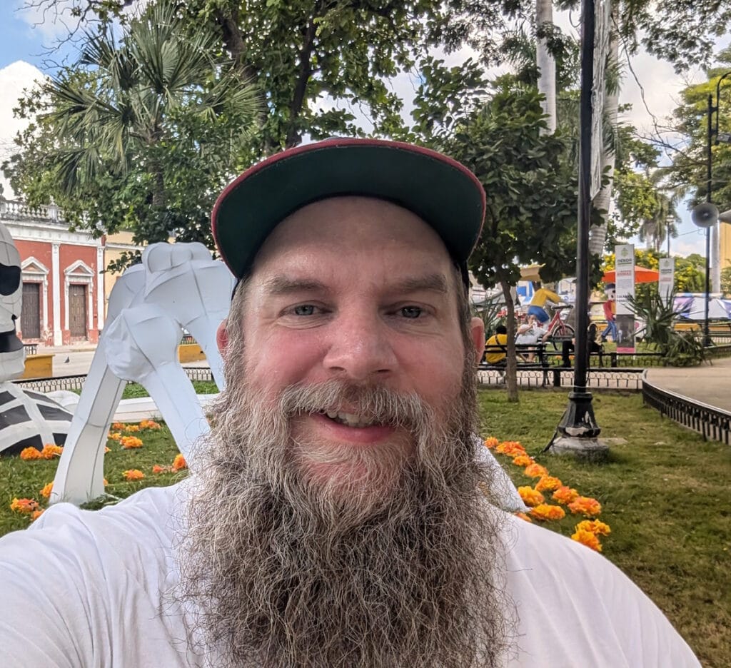 Self-portrait taken in San Juan de Merida Park about 10 days after falling into a water-filled pothole and almost breaking my leg.