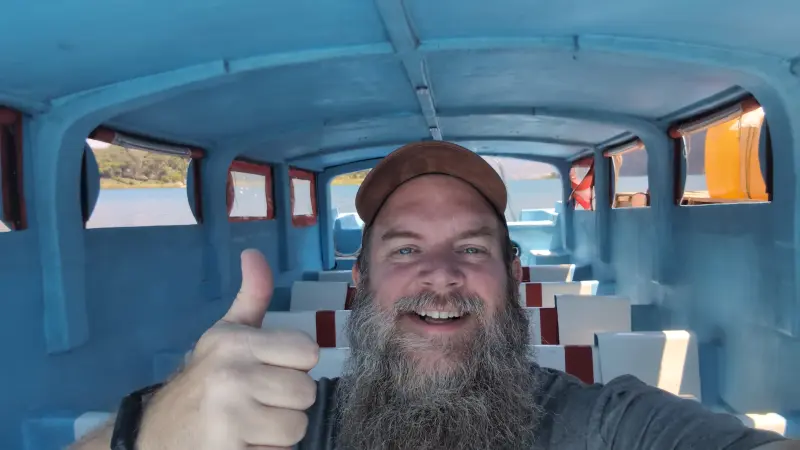 Lake Atitlan – How To Almost Disappear Completely For Nearly A Month WanderBeard Sitting in Lancha Boat On Lake Atitlan Guatelama
