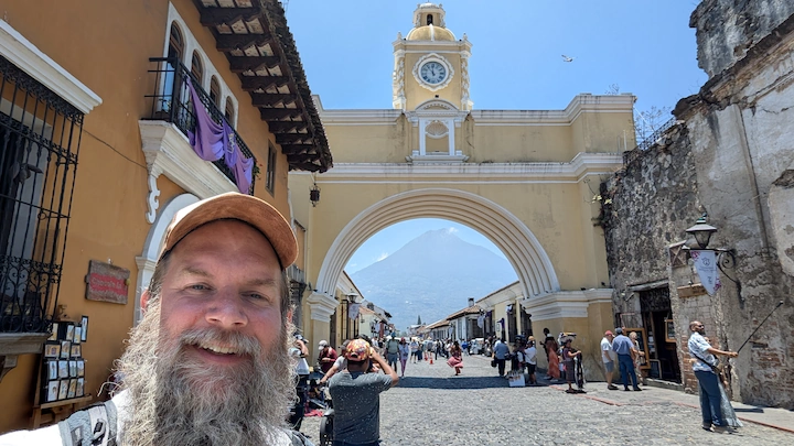WanderBeard At Arco de Santa Catalina With Volcan De Agua In Distance Guatemala