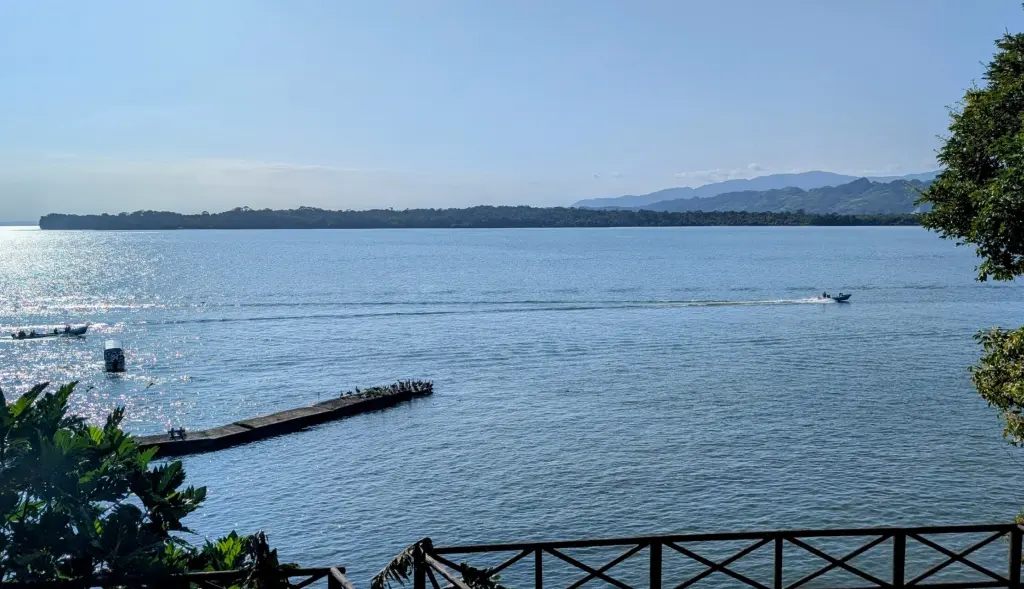 Floating Down The Rio Dulce For A Week, Discovering Guatemala’s Hidden Gem! View of Rio Dulce From Hotel Villa Caribe in Livingston, Guatemala
