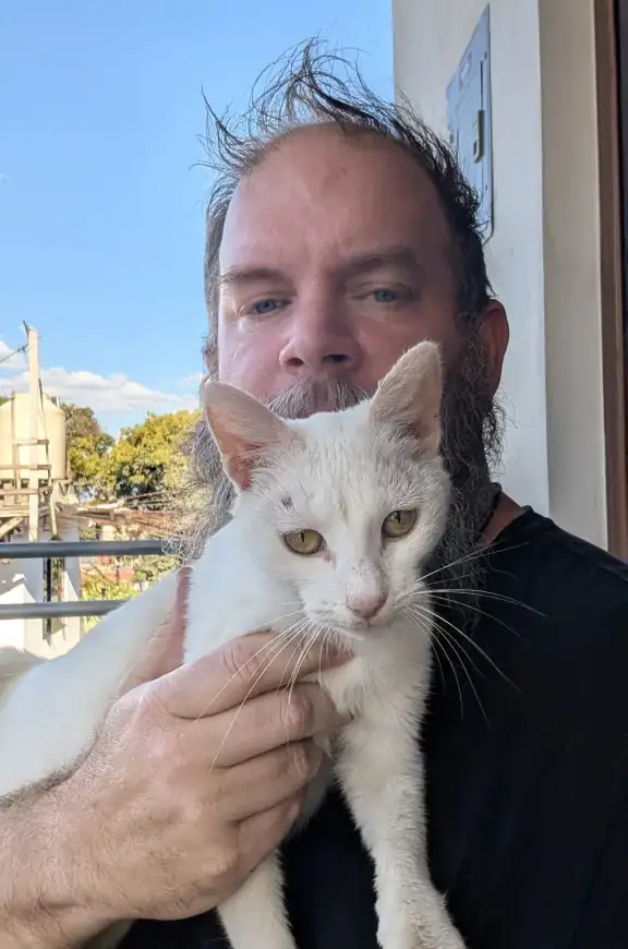 My Thoughts on Dogs and Cats and the Terrible Way Many Tourists Often Treat Them. WanderBeard With Pregnant Stray Cat In San Juan La Laguna, Lake Attilan, Guatemala